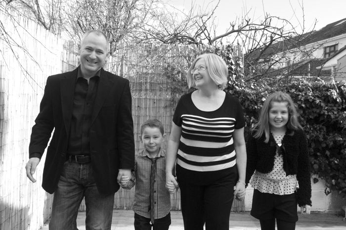 Portrait of family in back garden