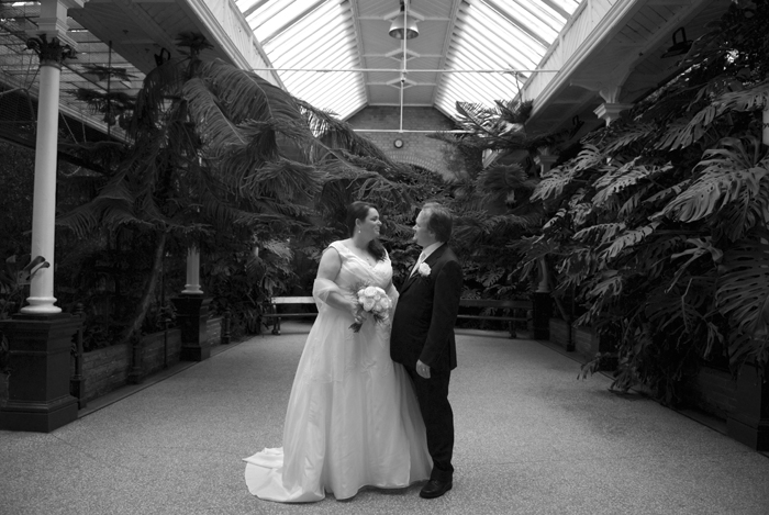 The bride and groom pose for a wedding photograph in the Historic Roberts house at Dublin Zoo
