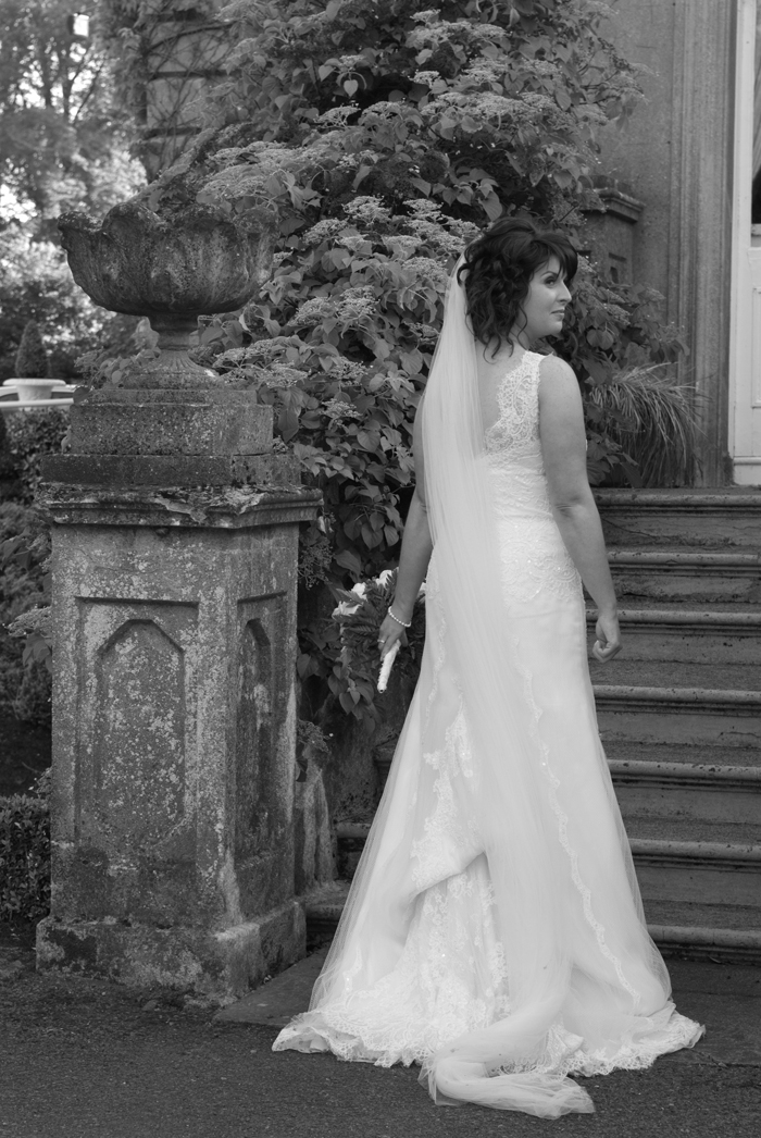 The bride poses for a wedding photograph in the grounds at Finnstown Country House Hotel, Lucan