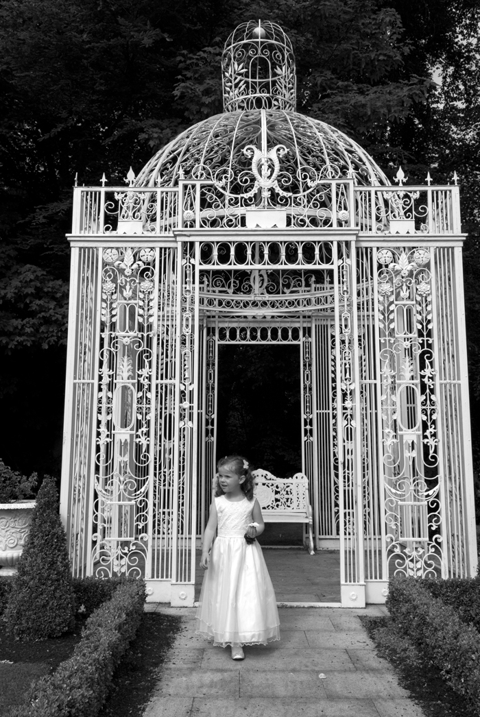 The flower girl pose for a wedding photograph at the gazebo in the grounds of Finnstown Country House Hotel, Lucan
