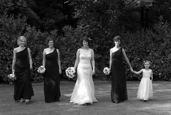 The bride and her bridal party pose for a wedding photograph in the grounds of Finnstown Country House Hotel, Lucan