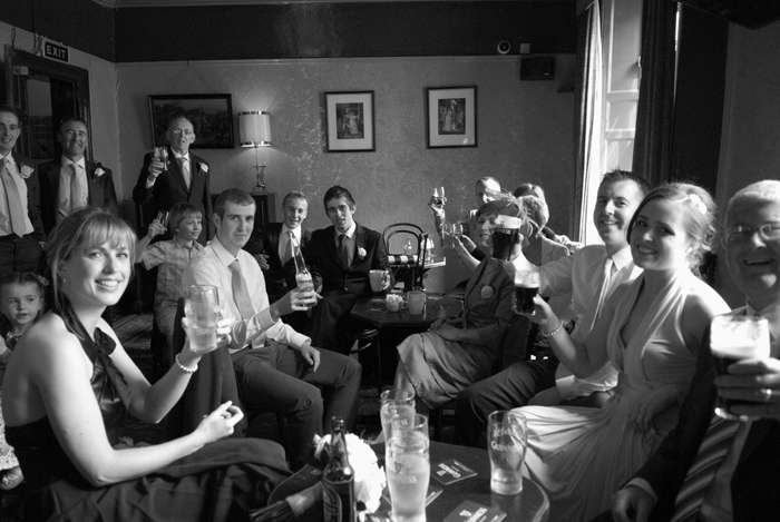 Wedding guests raise a toast to the bride and groom in Dublin
