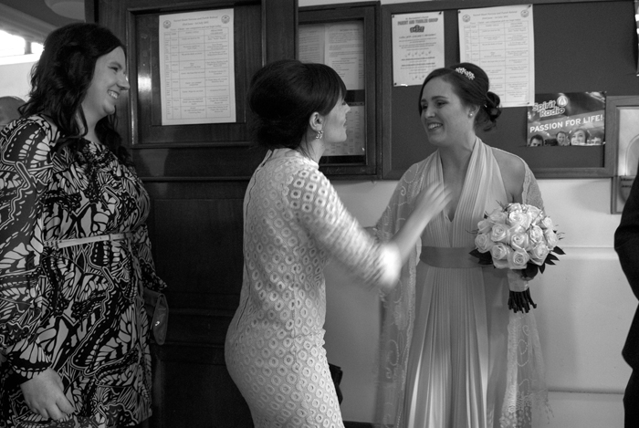 The bride greets wedding guests after being married at Mount Argus Church in Dublin