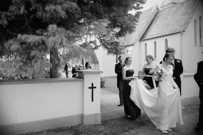 The wedding party leaves the grounds of  a country church in Sneem on The Ring of Kerry following a wedding ceremony.