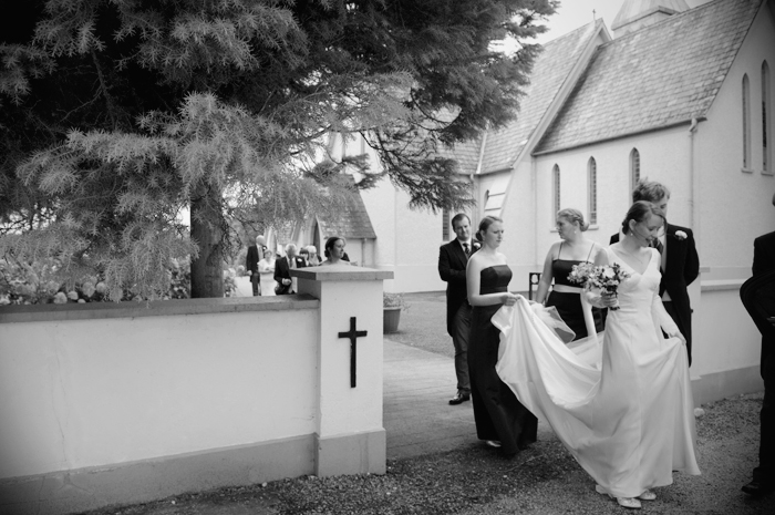 The wedding party leaves the grounds of a country church in Sneem on The Ring of Kerry following a wedding ceremony.