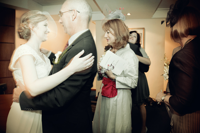 Guests congratulate the bride and groom after their wedding ceremony at the Dublin Registry Office