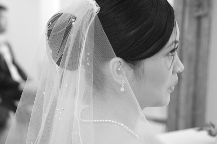 Close up portrait of the bride during her wedding ceremony at The Morrison Hotel in Dublin