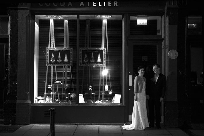 The bride and groom walk to their wedding party at Fallon & Byrne