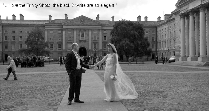 The bride and groom pose for a wedding photograph in the grounds of Trinity College Dublin